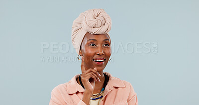 Buy stock photo Thinking, happy and black woman in studio with ideas, brainstorming or reflection on creative career. Decision, space and magazine editor on blue background for planning, solution or reminder.