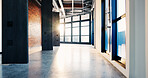 Modern, empty or flare in office for business, corridor or corporate interior in professional space. Vacant, contemporary passage or lobby with sunshine, spacious setting or glass windows in agency.