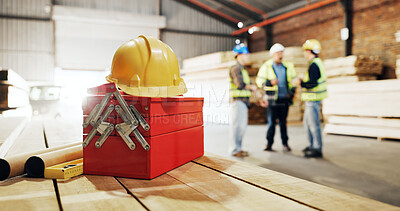 Buy stock photo Helmet, workshop and toolbox with men for carpentry, construction project and building. Site, contractor and hardhat for safety, compliance and ppe for renovation, infrastructure and woodworking