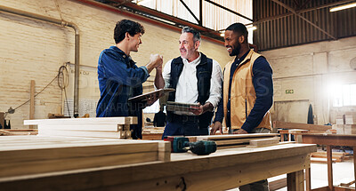 Buy stock photo Carpentry, fist bump and men with clipboard in workshop for furniture design, planning and woodworking. Success, carpenter and people on tech for teamwork, lumber production and building agreement