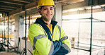 Crossed arms, man and portrait of construction worker on site with confidence for building, renovation or repair. Smile, about us and civil engineer with pride for property development or maintenance