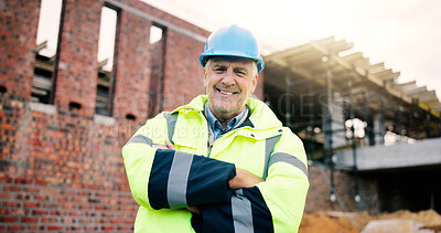 Buy stock photo Construction site, engineer and happy man with confidence outdoor for building development with helmet. Arms crossed, portrait and mature architect with smile, about us or safety inspector with pride