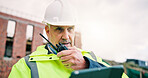 Radio, man and construction worker on site with tablet for research on building renovation. Tech, planning and mature civil engineer with feedback on maintenance, repairs or property development.