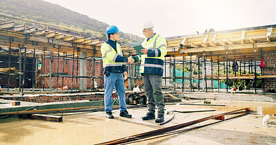 Buy stock photo Manager, team and handshake on construction site with tablet, building outdoor and quality assurance. Supervisor, people and shaking hands with tech for infrastructure, engineering approval and PPE.