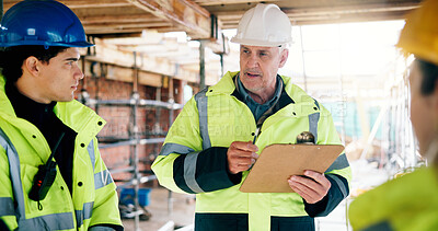 Buy stock photo Man, clipboard and team on construction site for discussion, compliance update or property development. Mature inspector, group and notes on worksite for safety training, planning or project feedback