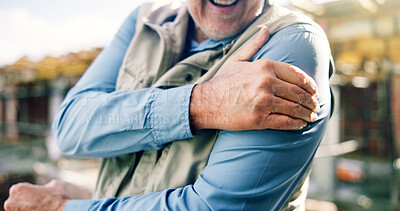 Buy stock photo Construction, hands and mature man with shoulder pain, accident and workplace injury on site. Contractor, engineering and person with joint ache, strain and hurt for tension, fibromyalgia and sprain
