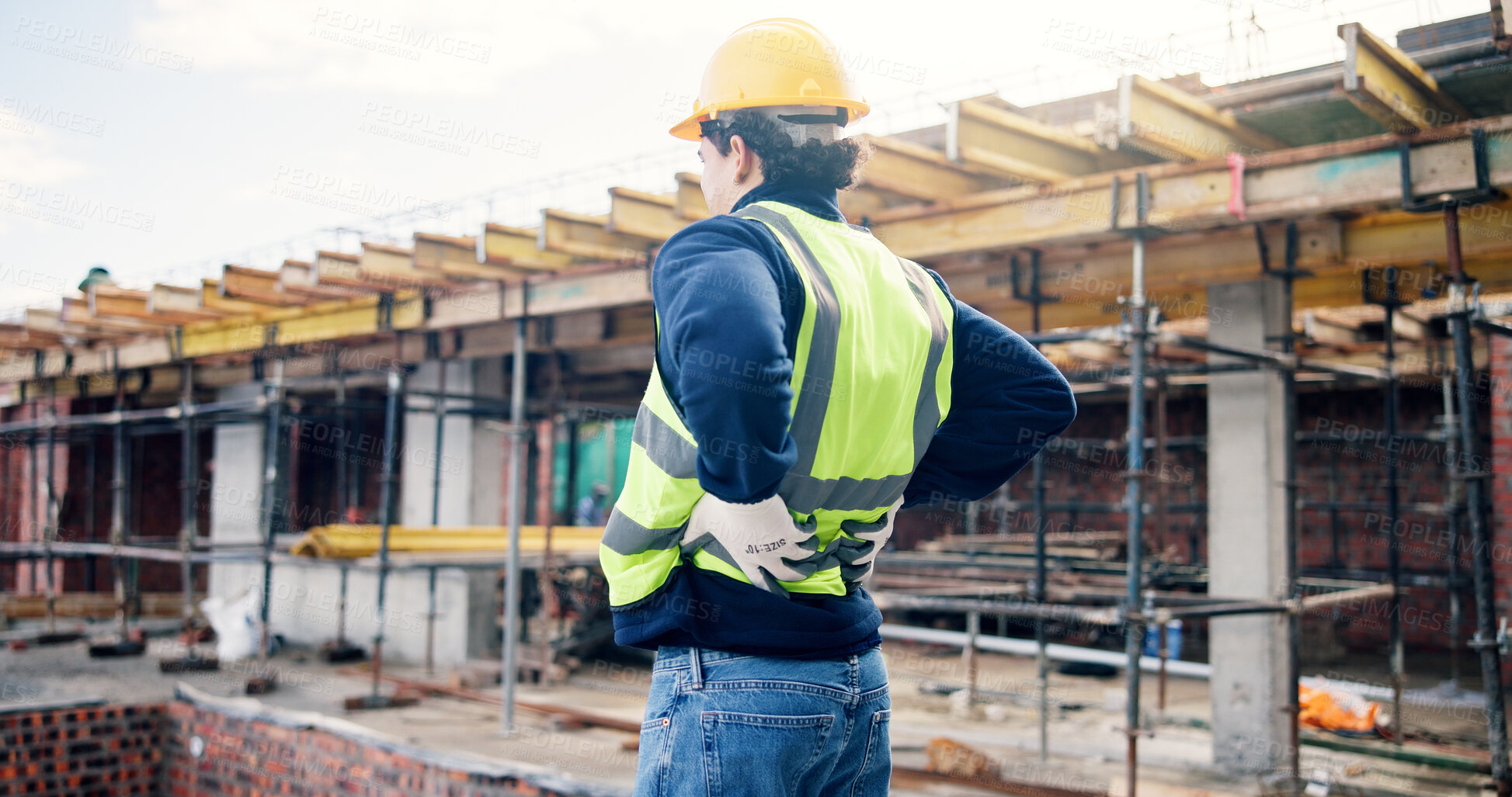 Buy stock photo Back pain, injury and man on construction site with accident, muscle fatigue and tension. Contractor, engineer and person with strain, fibromyalgia and pressure for burnout, posture and stress