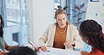 Meeting, documents and business women in office with planning for finance report with revenue. Discussion, paperwork and team of financial advisors in collaboration for investment proposal at agency.