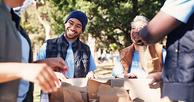 Buy stock photo Volunteer, team and donation package in park with smile, outreach contribution and non profit group. Happy people, charity project and paper bags outdoor with social responsibility, support and help.
