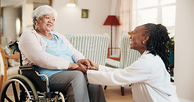 Buy stock photo Holding hands, nurse and old woman in wheelchair for checkup, healthcare or support. Care, conversation and smile with caregiver speaking to senior person with disability in home for rehabilitation