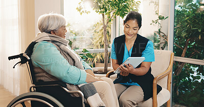 Buy stock photo Medical, nurse and tablet with old woman in wheelchair for advice, checkup or results. App, consulting and healthcare professional talking to senior patient with disability in home for rehabilitation
