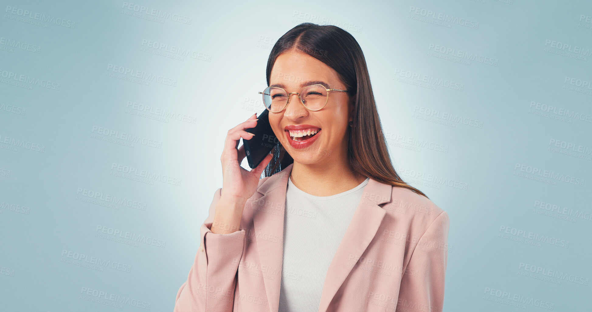 Buy stock photo Phone call, laugh and business woman in studio for insurance negotiation, feedback or space. Mobile, broker and happy person talking to contact, premium benefits or funny joke on blue background