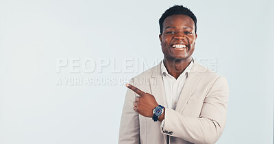 Buy stock photo Business, black man and pointing in studio with smile, advertising and sign up for job interview. Portrait, mockup space and happy with person, announcement and gesture for hiring on white background