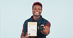 Delivery man, portrait and box in studio with POS, payment option and service with smile. Black person, parcel and card machine on white background space for logistics, supply chain and distribution