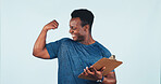 Clipboard, fitness and black man flexing in studio for muscle and body building training. Checklist, gym sign up and African personal trainer with smile for biceps challenge on white background