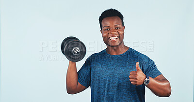 Buy stock photo Weight, thumbs up and portrait of black man in studio by space for workout, muscle training or health. Fitness, happy and person with dumbbell for body building or exercise on white background.