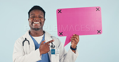 Buy stock photo Medical, portrait or doctor with pointing, speech bubble or treatment chat on wellness info. Social media, black man or gp with poster mockup, recovery feedback or health insight on studio background