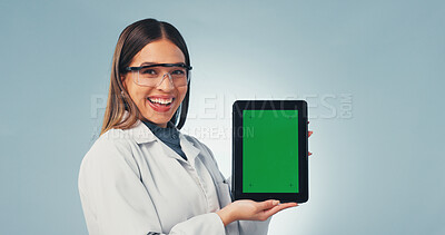 Buy stock photo Green screen, smile and tablet with portrait of scientist in studio for research, medical app and mockup. Science, healthcare portal and space with woman on white background for biotechnology report