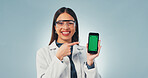 Green screen, pointing and phone with portrait of scientist in studio for research, medical app or mockup. Science, healthcare portal and space with woman on white background for biotechnology report