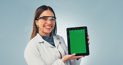 Buy stock photo Green screen, tablet and glasses with portrait of scientist in studio for research, medical app or mockup. Science, healthcare portal and space with woman on white background for biotechnology report