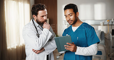 Buy stock photo Doctor, nurse and talk in hospital with tablet, medical research and problem solving for diagnosis. Healthcare worker, people and review patient test results in clinic with tech, discussion and plan.