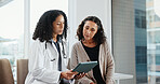 Clinic, patient and doctor with tablet, discussion and explaining medical diagnosis or consultation. Hospital, healthcare professional and women with technology, checkup and reading test results