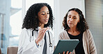Clinic, patient and doctor with tablet, checkup and explain medical diagnosis and report on website. Hospital, healthcare professional and happy women with technology, online and reading test results