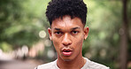 Fitness, portrait and man in park with break, cardio exhaustion and sweat in outdoor practice. Fatigue, bokeh and athlete in nature with breathing, training pause and exercise burnout with recovery.