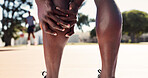 Legs, person and calf pain with injury on basketball court for exercise, fitness or training accident. Hands, sports athlete and massage muscle for fibromyalgia, arthritis or health crisis outdoor