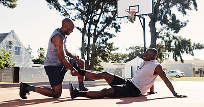 Buy stock photo Basketball court, help and black man with leg pain, accident or support with first aid outdoor. Game, African friends and player with sports injury on ground for fitness, training and muscle cramp