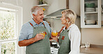 Cooking, happy and old couple in kitchen with orange juice, bonding together and retirement wellness. Married, senior people and meal preparation in house with healthy drink, nutrition and support.