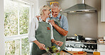 Cooking, support and old couple in kitchen with food, love bonding together and laugh for funny joke. Happy, married senior people and meal prep in home with wellness, humor and healthy nutrition.
