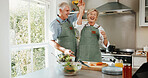 Cooking, fun and old couple in kitchen with dance, happy moment and bonding hug with culinary hobby. Smile, rhythm and senior people with meal prep, groove together and romantic connection in house.