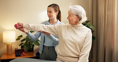 Buy stock photo Physiotherapist, senior and woman with dumbbell in private practice for weightlifting or session. Female person, coach or therapist with elderly client or weight for muscle recovery or rehabilitation
