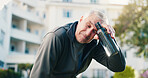 Fitness, tired and senior man in city for rest, workout recovery and wipe sweat with bottle. Exercise break, active retirement and person with water for health, exhausted and cool down with fatigue