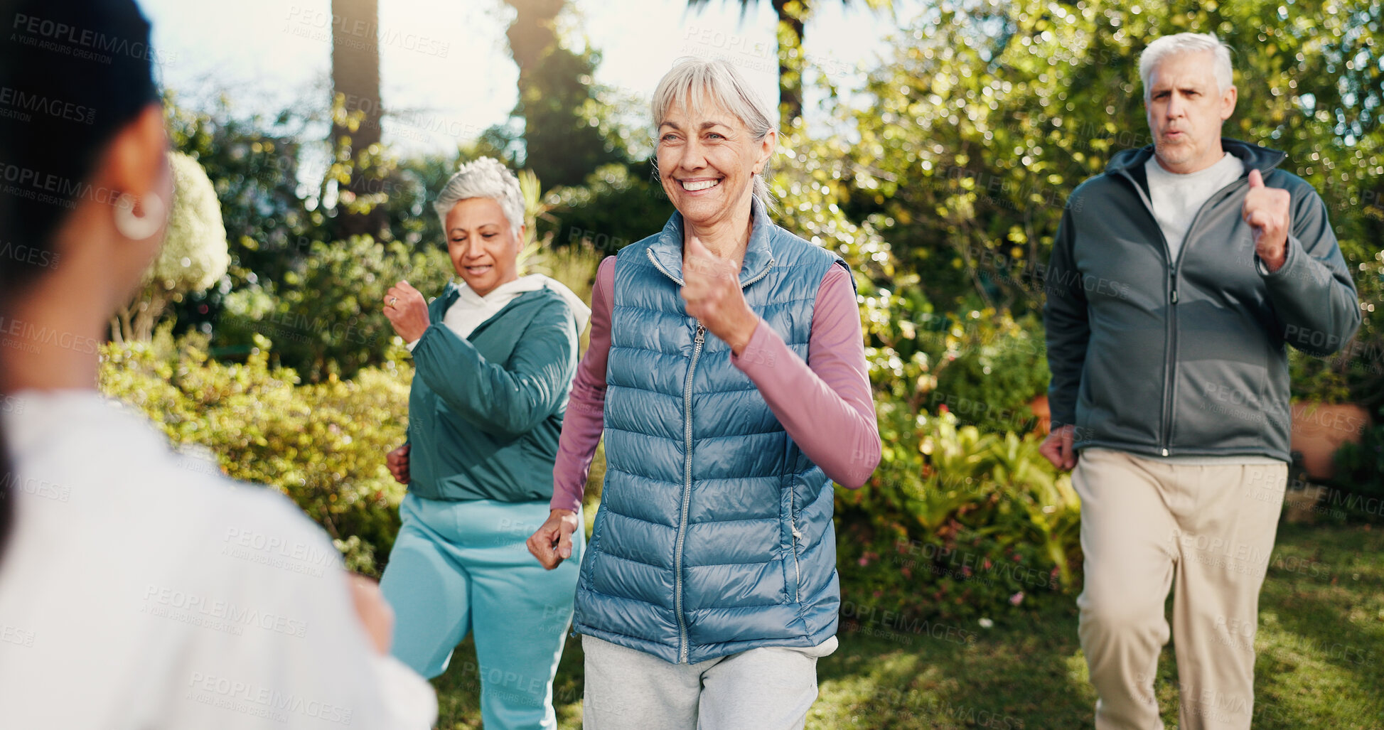 Buy stock photo Workout, class and old people outdoor with personal trainer, exercise together or smile for wellness. Fitness coach, senior group and happy in garden with cardio, guidance and retirement activity.