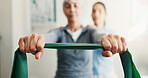 Hands, physiotherapy and resistance band with people in session together for exercise or healing. Fitness, rehabilitation and recovery of old person with chiropractor in health clinic for consulting