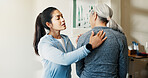 Physio, checkup and old woman in office with back pain, assessment and recovery from injury. Physiotherapist, massage or senior person at clinic for physiotherapy, spine evaluation and rehabilitation