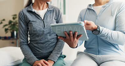 Buy stock photo Hands, physiotherapy and tablet with people in office together for healing or progress report. App, consulting and rehabilitation with chiropractor speaking to client in health clinic for recovery