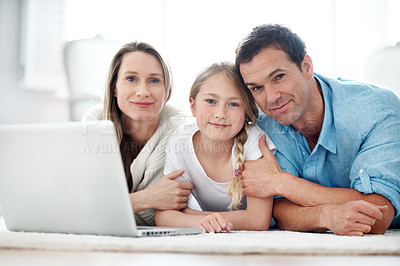 Buy stock photo Parents, smile and child with laptop on floor, portrait and streaming film with subscription in home. Online, movie and happy people with kid, family and relax with tech for entertainment in house