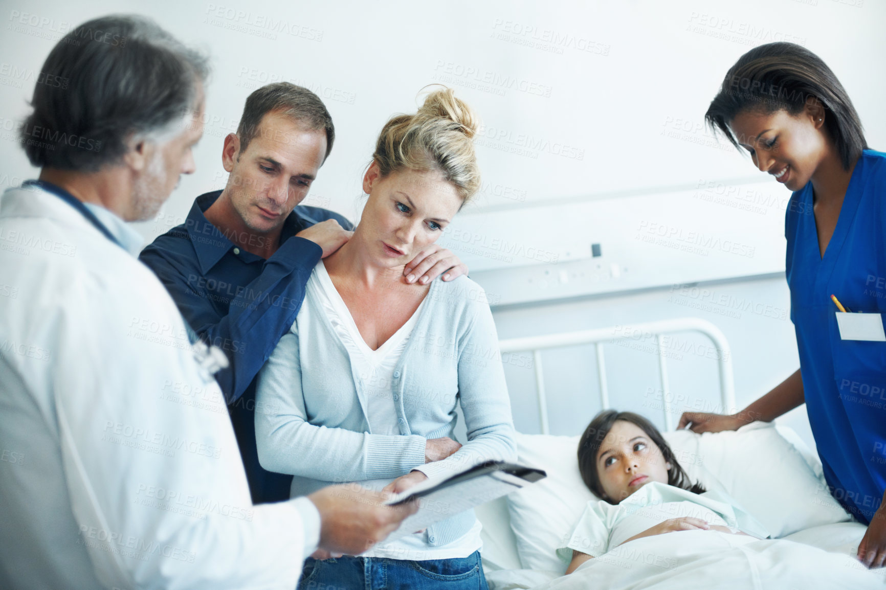 Buy stock photo Doctor, parents and sick child in hospital bed, results and medical clipboard for recovery progress. Mom, dad and pediatrician consultation, patient report and support girl with nurse for healthcare