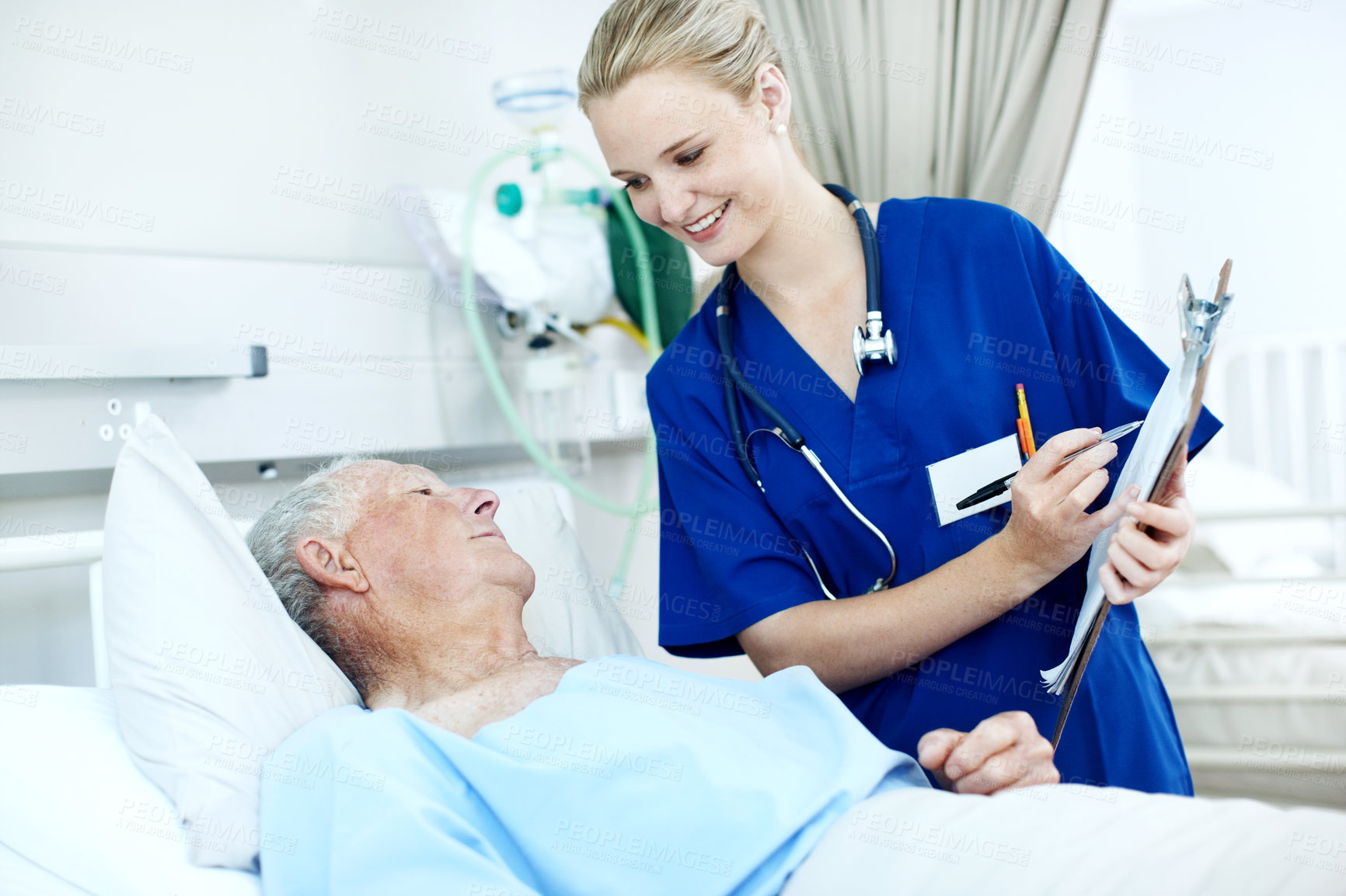 Buy stock photo Reading, nurse and senior man in hospital for checkup, support or rehabilitation with recovery. Clipboard, consultation and caregiver with elderly patient for medical help, discussion or assistance.