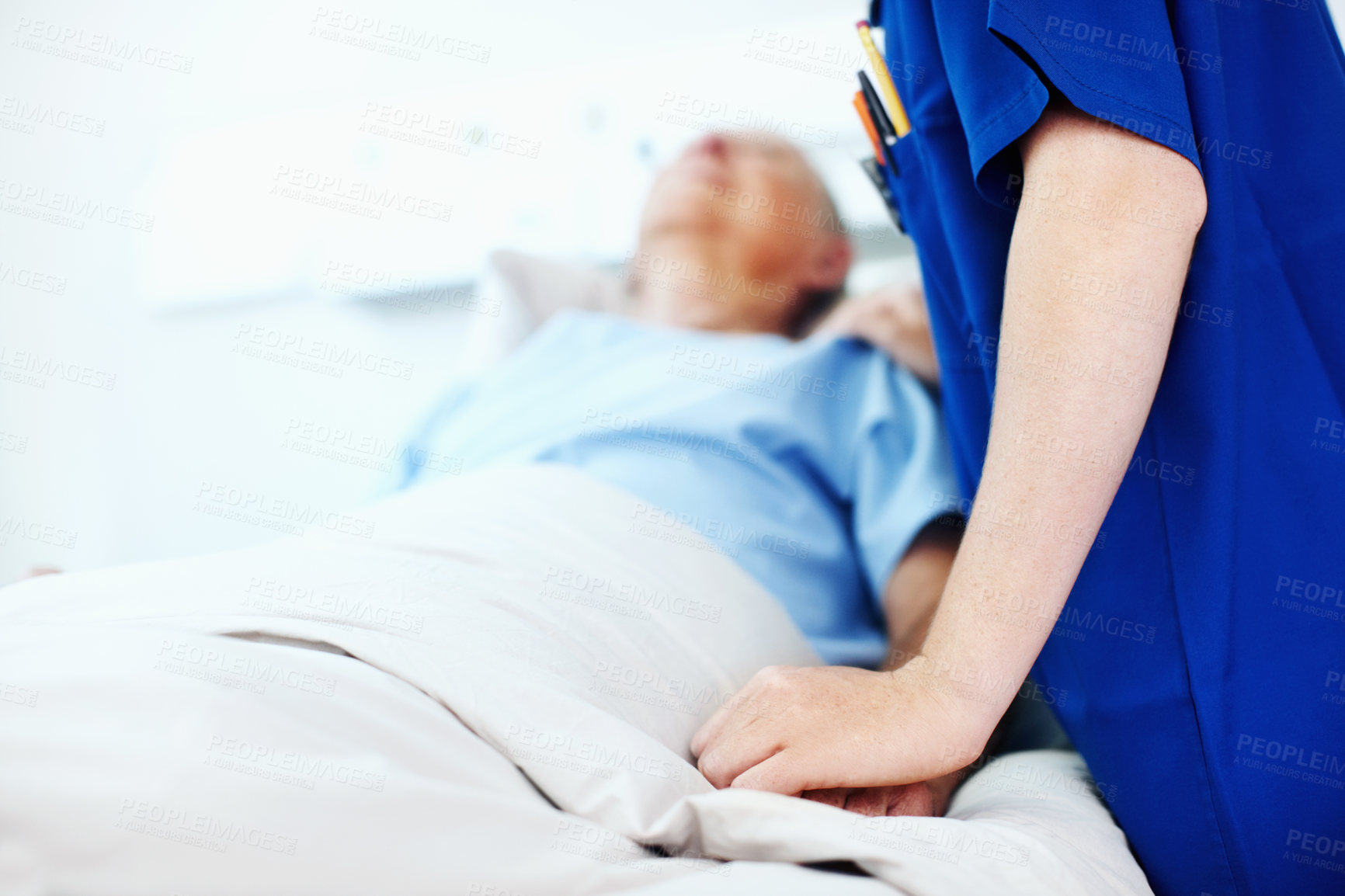 Buy stock photo Hands, nurse and comfort person in hospital bed for medical care, emotional support and recovery. Health, professional and wellness check on patient in clinic ward for healing, compassion and service