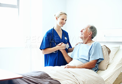 Buy stock photo Consulting, support and nurse with old man in hospital bed for medical advice, recovery progress and exam. Healthcare feedback, smile and diagnosis review with senior person in clinic for update
