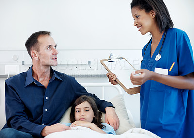 Buy stock photo Nurse, clipboard and smile with child in hospital bed for checkup, support or pediatrics discussion. Woman, girl and father in clinic for treatment, document and medical consulting or assessment