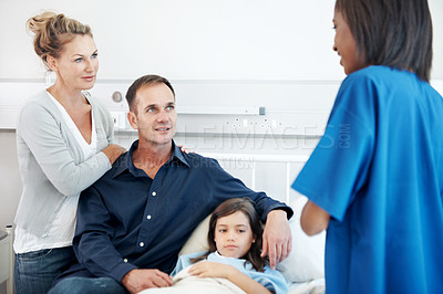 Buy stock photo Nurse, parents and talk in hospital with sick child, wellness update and planning for virus treatment. People, mother and father in clinic with daughter, healthcare worker and discussion for healing.