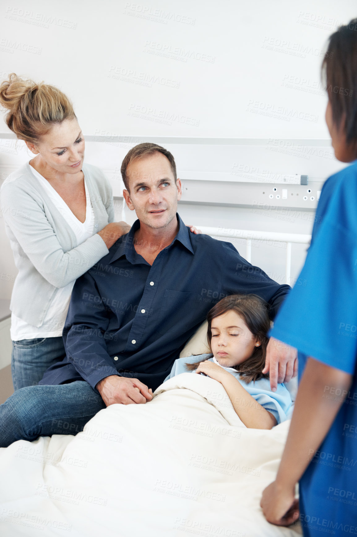 Buy stock photo Nurse, parents and discussion in hospital with sick child, wellness update or planning for treatment. People, mother and father in clinic with daughter, healthcare worker and conversation for healing