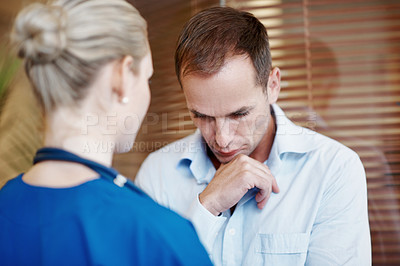 Buy stock photo Nurse, empathy and console sad man in hospital with support, compassion or assurance for recovery. Healthcare worker, worried person and help in clinic with stress, comfort or understanding emotions.