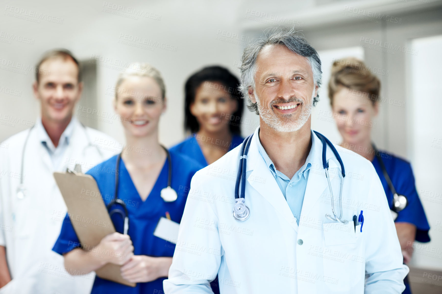Buy stock photo Team, portrait and meeting with doctors in hospital for healthcare, solidarity and consulting. Medical, nurses and about us with people in hallway of clinic for support, community and collaboration