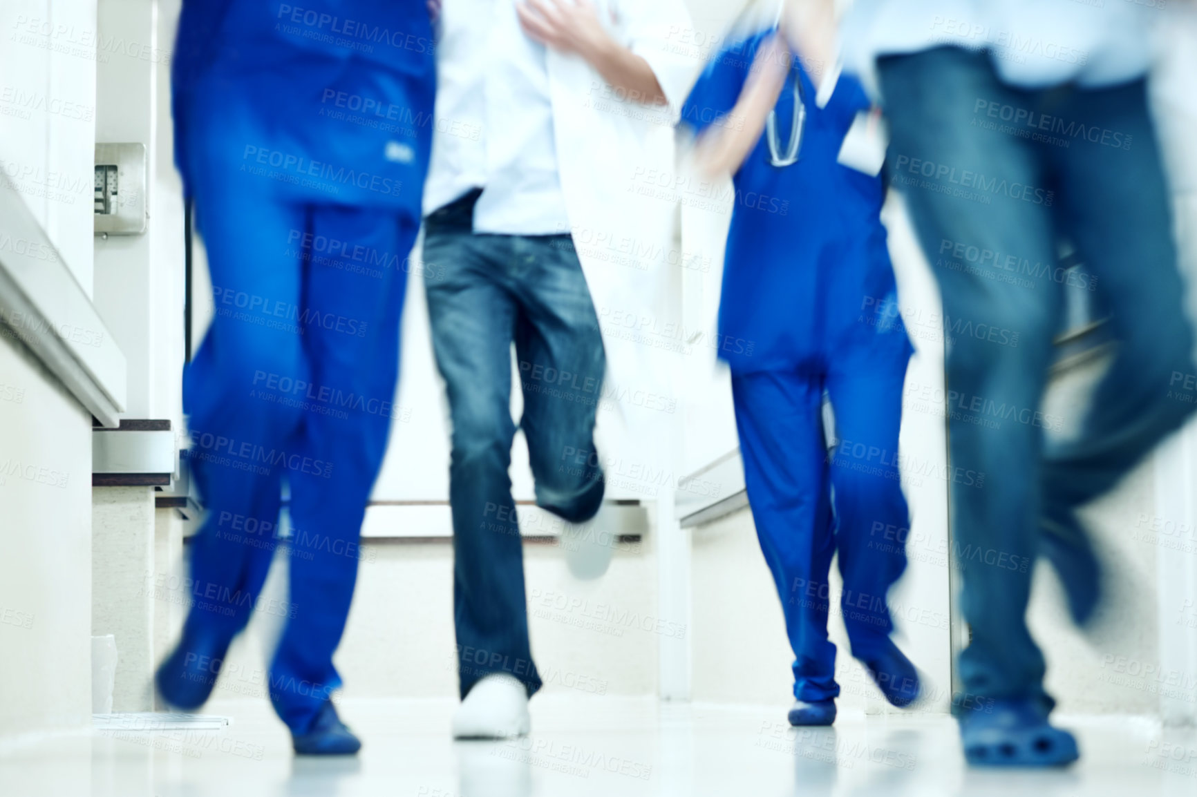 Buy stock photo Running, rush and feet of doctors in hospital for emergency,  motion blur and medical crisis. Accident, healthcare team and wellness with people in clinic for support, urgency and code blue alert